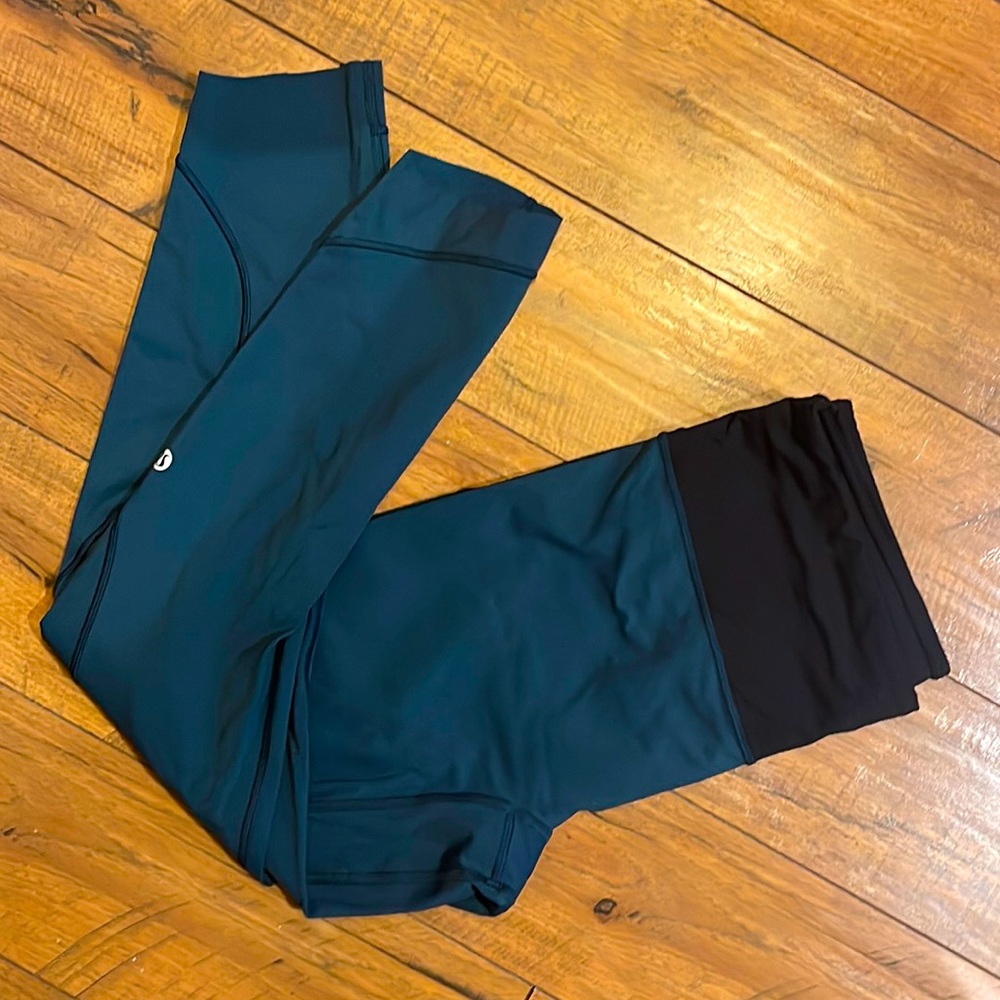 Lululemon slanted crop legging with zipper pocket in back. Gently worn.